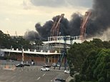 Massive fire erupts at Sydney Olympic Park