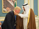 Trump curtsies for King Salman
