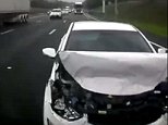 Footage shows driver on phone crash on Queensland highway