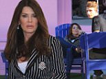 Lisa Vanderpump lounges in front of her dog rescue center