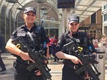 Armed police reassure Britons on Bank Holiday weekend