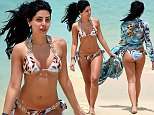 Cara de la Hoyde slips into bikini on a Cape Verde beach