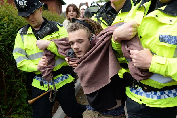 Watch moment police arrest protester at Theresa May's North Wales visit