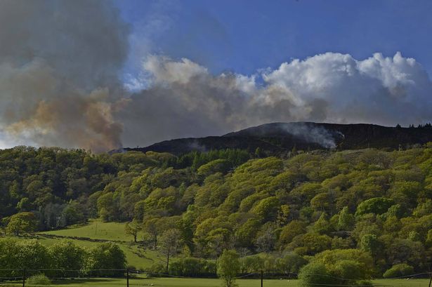 Firefighters tackle 50 acre gorse fire at Gwynedd village for nearly two days