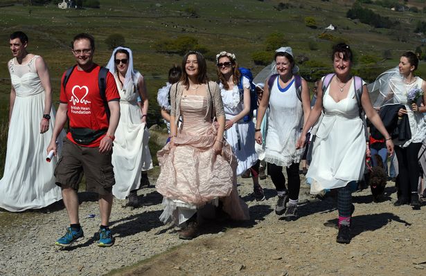 Watch 'wedding party' set off up Snowdon for bittersweet climb