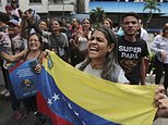 Dozens hurt, 1 dead in violent day of protests in Venezuela