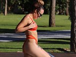 Stephanie Davis enjoys sunny pool-side splash