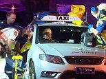 Sydney taxi driver trapped in his car for an hour