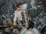 Teenager scales antenna on skyscraper in Hong Kong