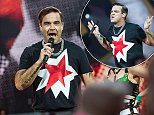 Robbie Williams puts on energetic performance in London