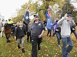 Hundreds of protesters clash with police in Melbourne