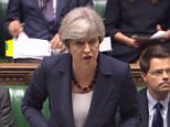 Grenfell Tower cladding didn't comply with rules, says May