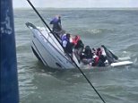 Boat sinks as passengers are sent swimming in Lake Erie
