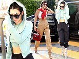 Kendall Jenner flashes abs with Bella Hadid in Paris