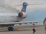 United flight erupts in flames before landing in Denver
