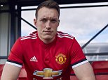 Manchester United unveil new home kit with buttoned collar
