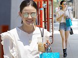 Lucy Hale is summer chic as she shows off legs