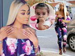 Blac Chyna shows off curves in floral catsuit