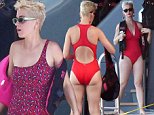 Katy Perry flaunts figure in racy leopard print swimsuit