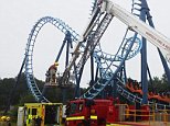 Man injured on rollercoaster after dozens trapped at 50ft