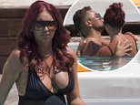 Amy Childs display post-baby figure in low-cut swimwear