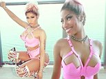 Nicki Minaj dances in pink PVC lingerie and harness