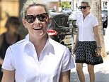 Elizabeth Banks shows off her legs in a spotty mini-skirt