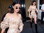 Kendall Jenner accentuates her tiny waist in ruffled dress