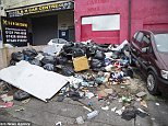 Muslim volunteers clean rubbish-filled Birmingham streets