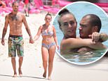 Chloe Green and Jeremy Meeks kiss in the sea in Barbados