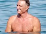 The Expendables' Dolph Lundgren shows off impressive abs