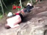 Teen tries rope swing and flails to the ground in video