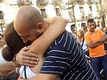 Muslim man offers free hugs in Las Ramblas