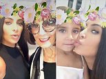 Kim Kardashian ignores Taylor Swift drama with family day