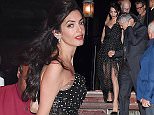 Amal Clooney shows off her post baby physique in Venice