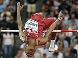 The Latest: Barshim wins world title in high jump