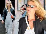 Claire Danes keeps cool in a white summer maxi-dress in NY