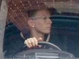 Coleen Rooney is seen WITHOUT her wedding ring