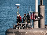 US submarine returns to port flying pirate flag