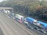 Police close M1 both directions causing five-mile queues