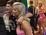 Louis Tomlinson cuddles singer Bebe Rexha in Las Vegas