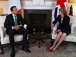 May: Hard border with Ireland after Brexit 'unacceptable'