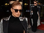 Fergie wows in form fitting dress while out in Paris