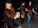 Party girl Laura Simpson slips into leather mini skirt