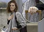 Rose Leslie flashes her HUGE diamond ring at Heathrow