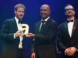 Prince Harry joins glamorous stars at the Attitude Awards
