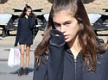 Kaia Gerber dons oversized hoodie with combat boots