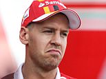 Sebastian Vettel fighting in F1 battle with Lewis Hamilton