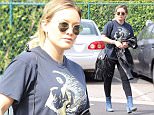 Hilary Duff is spotted out in LA in denim ankle boots
