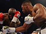 Anthony Joshua defeats Carlos Takam with tenth round TKO